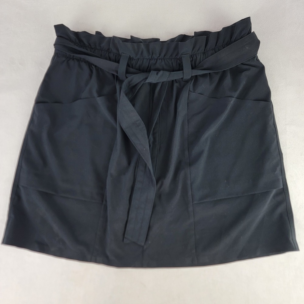 Athleta Skyline Skort Size 4 Black Tie Waist Golf Tennis Outdoors Pockets Shorts